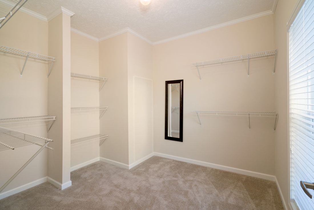 The 1545 JAMESTOWN Master Bedroom closet. This Manufactured Home features 3 bedrooms and 2 baths.
